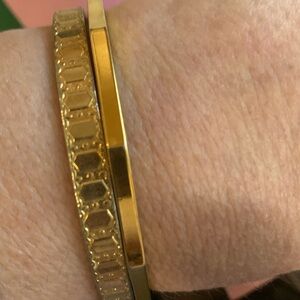 Two gold tone bracelets*